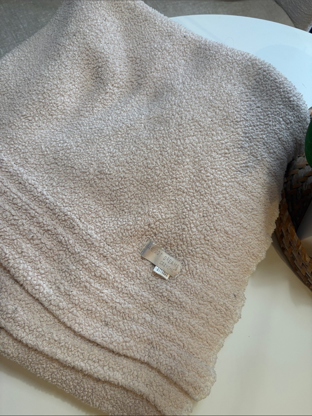 Barefoot Dreams Cozy Blanket - light pink.  VERY PILLY needs to be dry cleaned